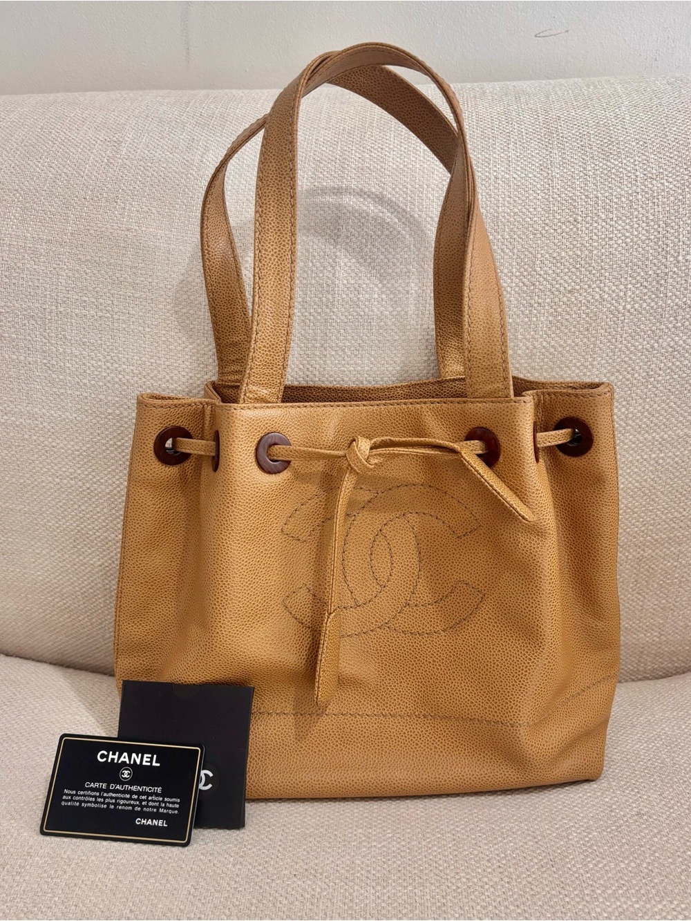 Authentic CHANEL brown caviar mini drawstring bucket bag
